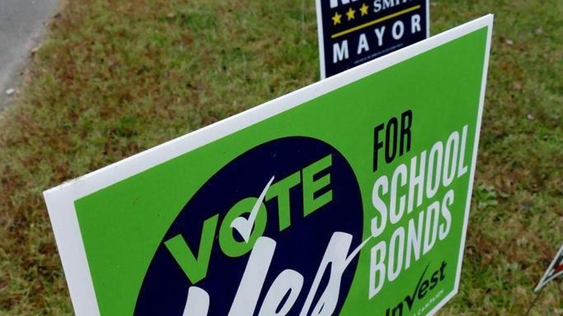 A sign promoting Charlotte-Mecklenburg school bonds outside East Stonewall AME Zion Church Tuesday morning.
