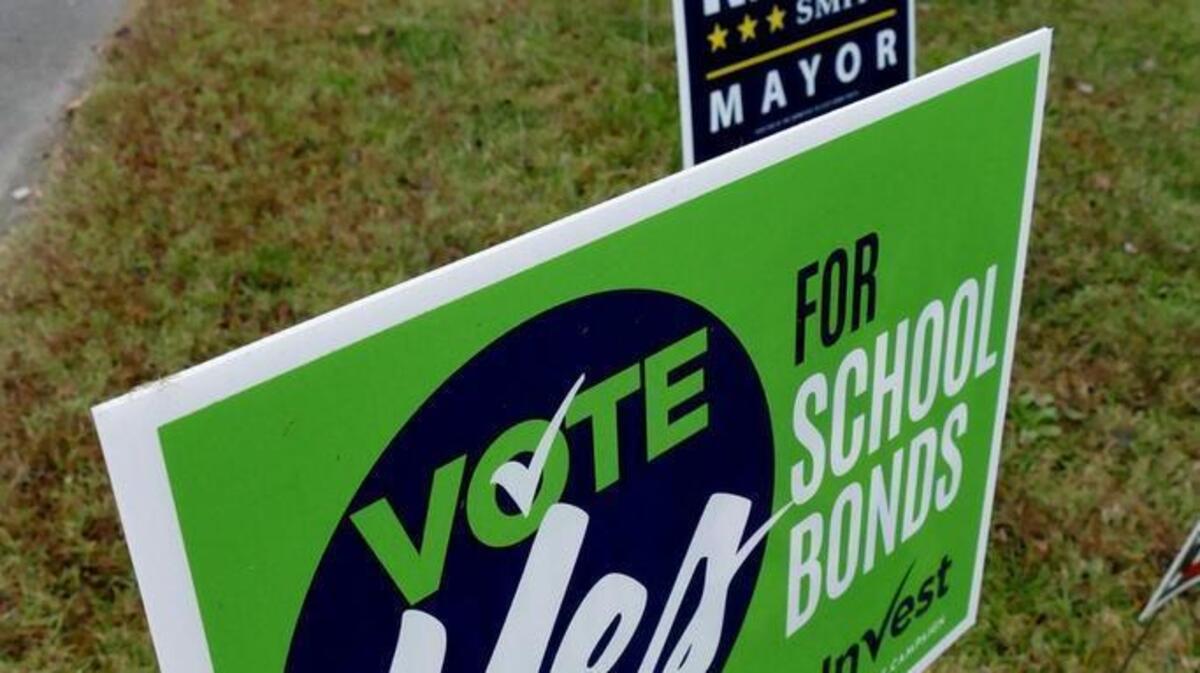 A sign promoting Charlotte-Mecklenburg school bonds outside East Stonewall AME Zion Church Tuesday morning.