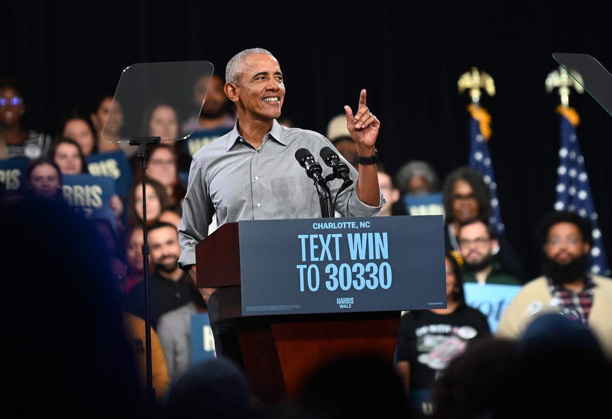 Former President Barack Obama smiles at the audience as he speaks at the Charlotte Convention Center in Charlotte, NC on Friday, October 25, 2024. The former President was the key speaker at a Harris for President rally,