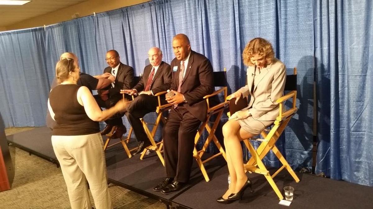 
Democratic mayoral candidates (left to right) Michael Barnes, Mayor Dan Clodfelter, David Howard and Jennifer Roberts prepare for Wednesday’s forum. They followed Republicans Scott Stone and Edwin Peacock.
