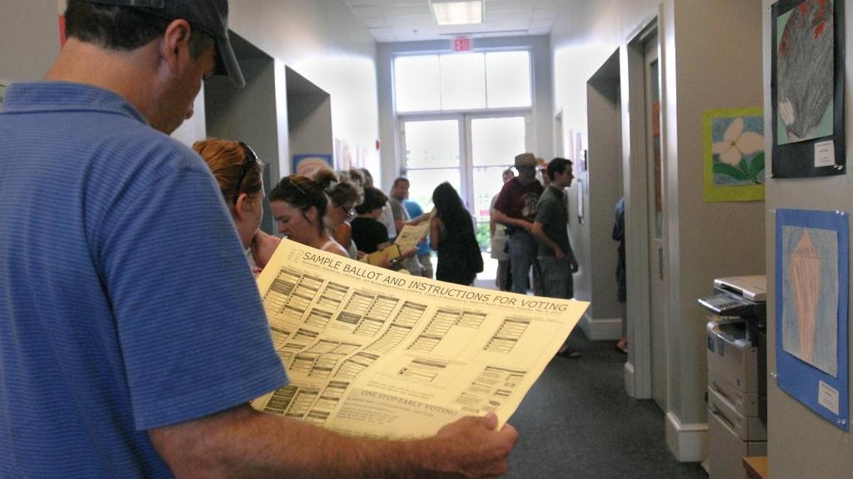 
Dozens of voters lined up on the last day of early voting in 2012. Don’t worry, the ballot for this September’s primary isn’t quite as long.
