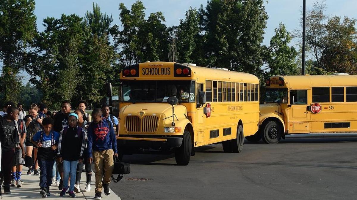 Students arrive at J.M. Alexander Middle School, one of 176 the Charlotte-Mecklenburg school board oversees.