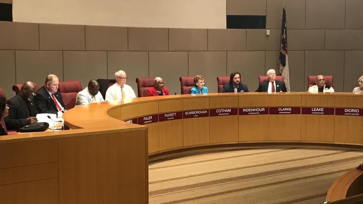 The Mecklenburg County commissioners discuss a budget plan on Tuesday at the Government Center.