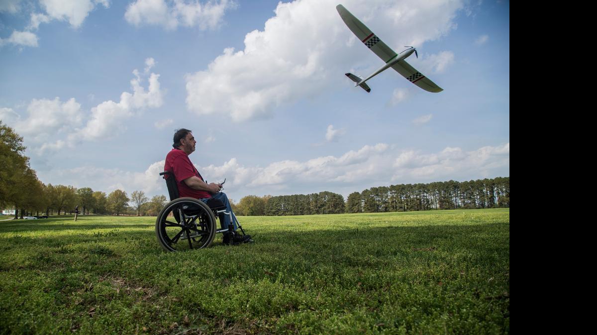 
Tim Bagnall of Apex flies his electric-powered sail plane Wednesday, April 8, 2015, at the Dorothea Dix campus in Raleigh. 
