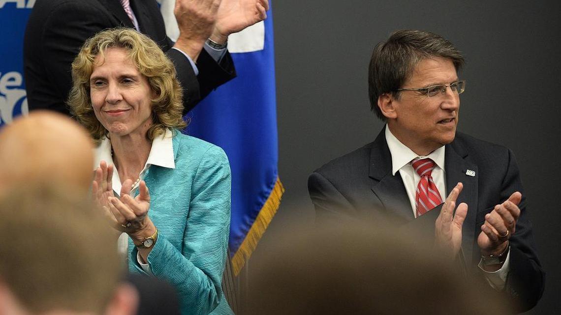 Charlotte Mayor Jennifer Roberts and North Carolina Gov. Pat McCrory applaud at an event at the Charlotte Chamber of Commerce announcing that PayPal, Inc. would open a Global Operations Center in Charlotte, creating 400 new jobs and investing $3.6 million by the end of 2017. PayPal ended up dropping those plans because of House Bill 2.