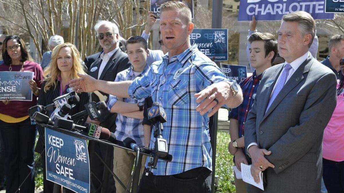 David Benham speaks to media and supporters at a rally to address Charlotte’s expanded nondiscrimination ordinance outside of the Charlotte-Mecklenburg Government Center in March, just days before North Carolina lawmakers passed House Bill 2. A federal judge in Texas has potentially deepened the legal fight over HB2 by blocking an Obama administration order giving transgender students in public schools access to bathrooms and locker rooms matching their gender identity.