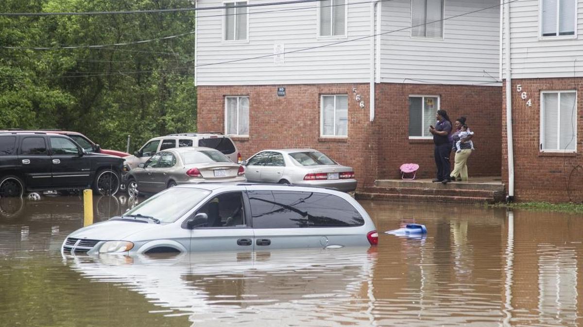 Heavy rain flooded cars and threatened homes in Raleigh after a storm in April 2017.