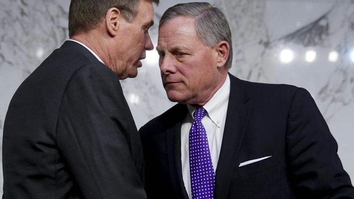 Senate Intelligence Committee Chairman Richard Burr and Vice Chair Mark Warner speak following a Senate Select Committee on Intelligence hearing on worldwide threats in Dec. 2019.
