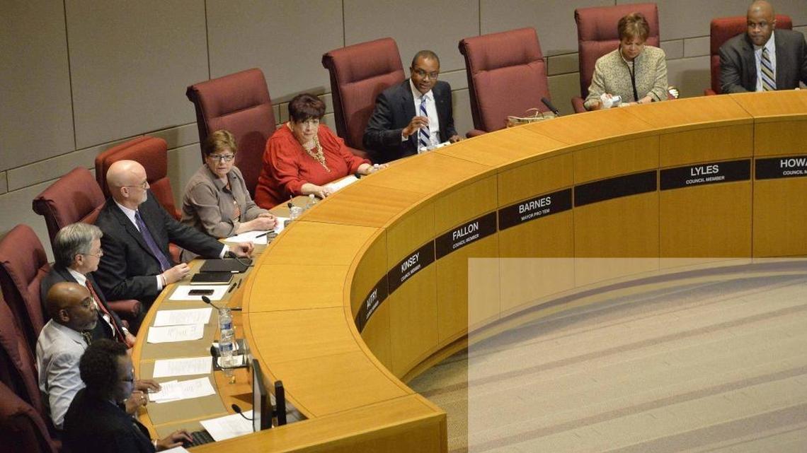 Former council member Michael Barnes (center), speaks during a City Council meeting.