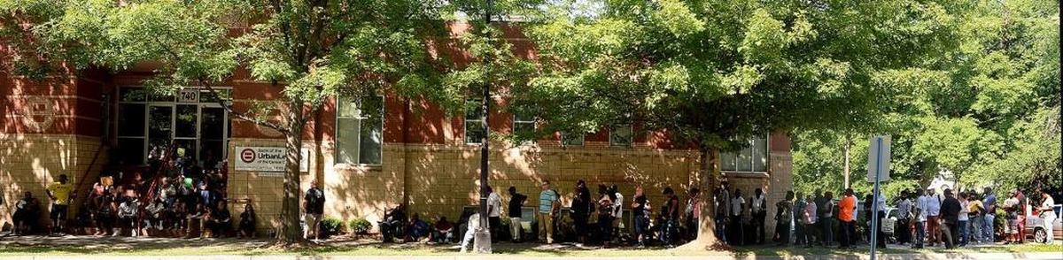 Huge lines in front of the Urban League at a May expungement clinic at the Urban League in Charlotte. More than 1,300 people registered for help in getting an old criminal conviction removed from their records.