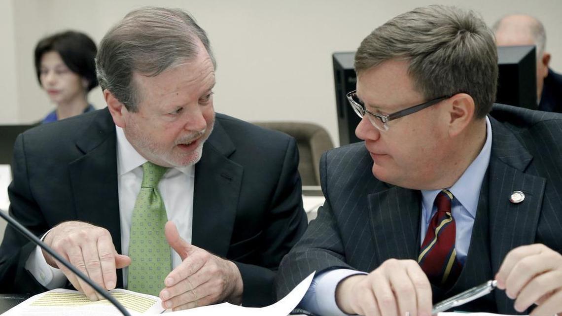 Co-Chairs Sen. Phil Berger, President Pro Tempore NC Senate, left, and and Rep. Tim Moore, Speaker of the NC House confer before the start of the Joint Legislative Commission on Governmental Operations meets at the Legislative Office Building in Raleigh, NC on Nov. 18, 2015.