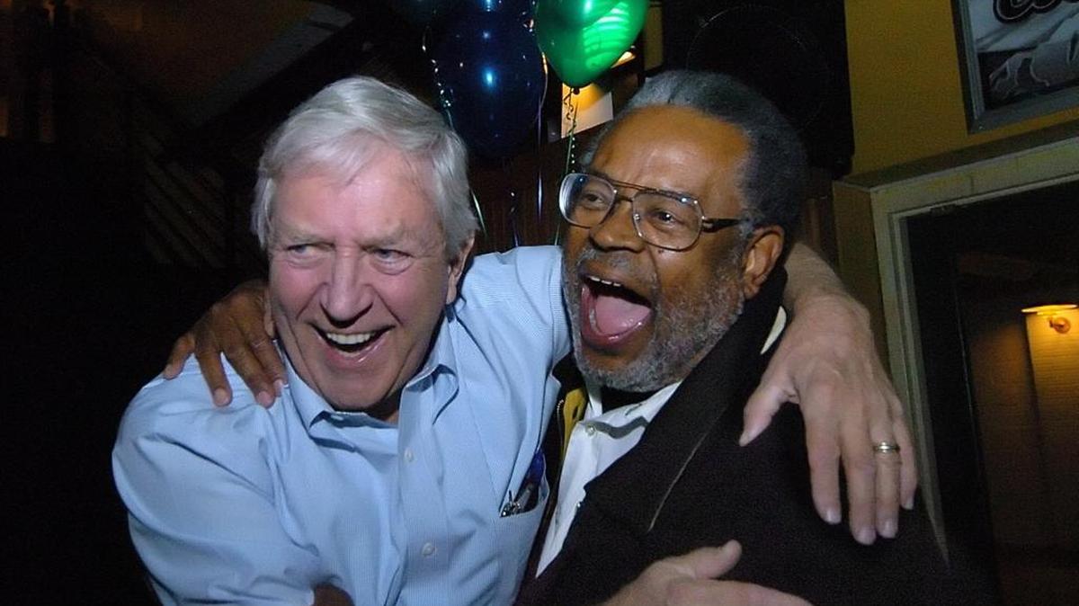 Malachi Greene, right, and Fountain Odom celebrate favorable early returns for a bonds vote at Dilworth Grill in Charlotte in 2007.