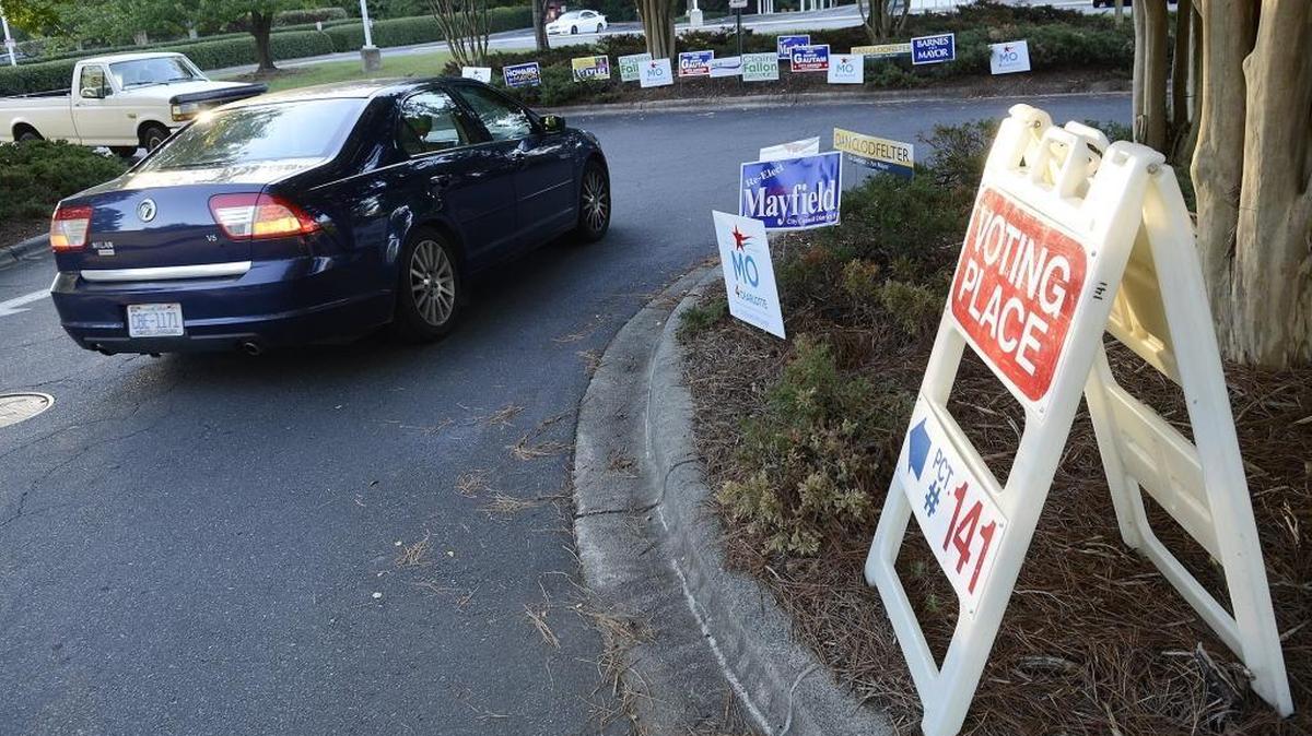 Charlotte voters go to the polls Tuesday to elect their fifth mayor in three years as well as a new City Council.
