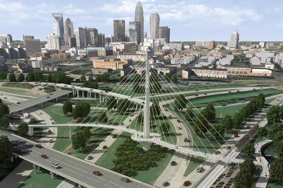 The original idea of a pedestrian and bike bridge over the U.S. 74 and I-277 interchange did not have a fixed design, but city officials said it would have been an iconic city symbol.