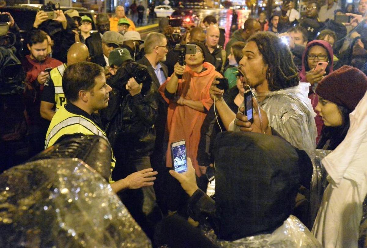 Braxton Winston confronts police during last year’s protests. “My method of protest is that I want to yell and scream and protest, so I can get into a room,” he has said. “And then when I get across the table, I can effectively voice the same message with different words.”