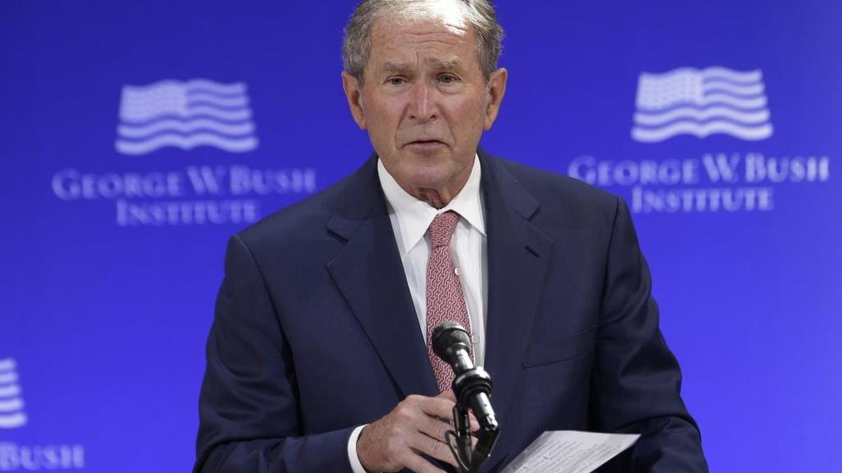 FILE- In this Thursday, Oct. 19, 2017 file photo, former U.S. President George W. Bush speaks at a forum sponsored by the George W. Bush Institute in New York. Bush spoke Thursday at a summit in Abu Dhabi put on by the Milken Institute, an economic think tank based in Santa Monica, California.