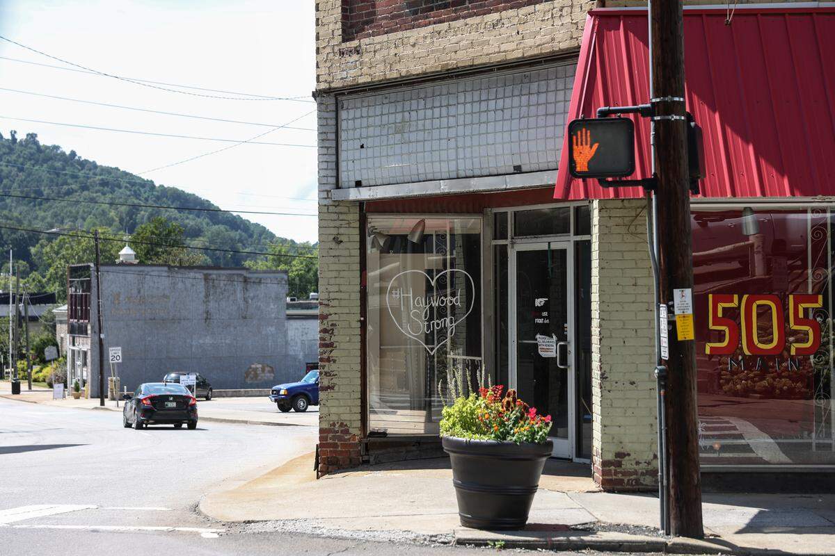 “#HaywoodStrong” is painted on a window in downtown Canton to show support for the area after historic flooding from the Pigeon River following heavy rain and stormfronts from Helene in September 2024. 