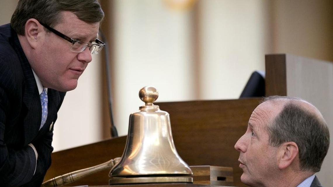 House Speaker Tim Moore talks with House Bill 2 sponsor Rep. Dan Bishop of Mecklenburg County, right during debate on the House floor on Wednesday, March 23, 2016 in Raleigh, N.C.