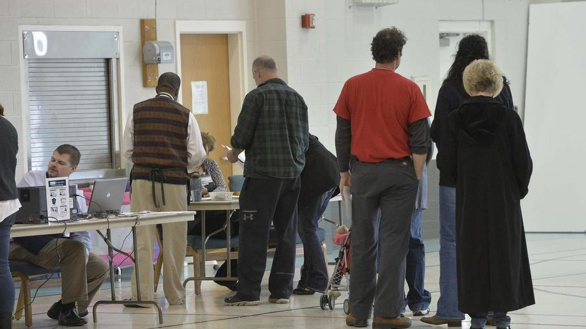 
Voters stand in line to receive their ballots during Tuesday's election at Southminster Presbyterian Church in Gastonia on Nov. 04, 2014.

