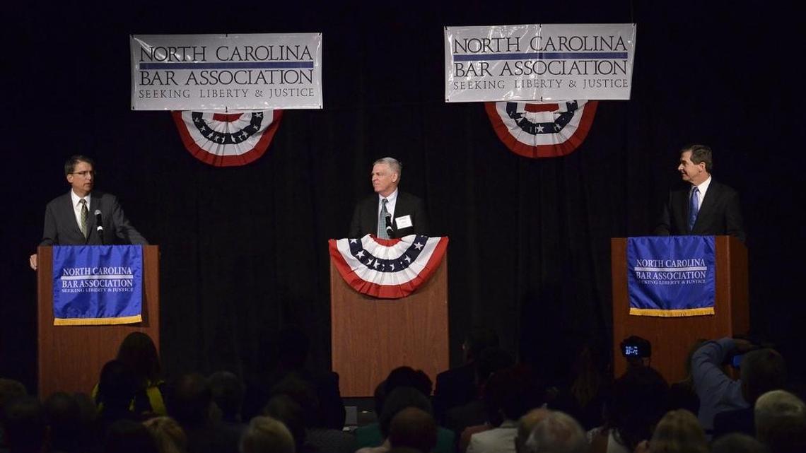 Attorney General Roy Cooper, right, holds a small lead over incumbent Gov. Pat McCrory, left, in the gubernatorial election, which is not yet certified.