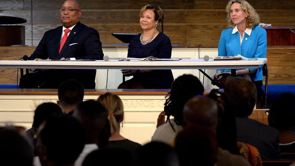 Charlotte mayoral candidates Joel Ford, left, Vi Lyles and Jennifer Roberts at a May 18 debate in Charlotte.