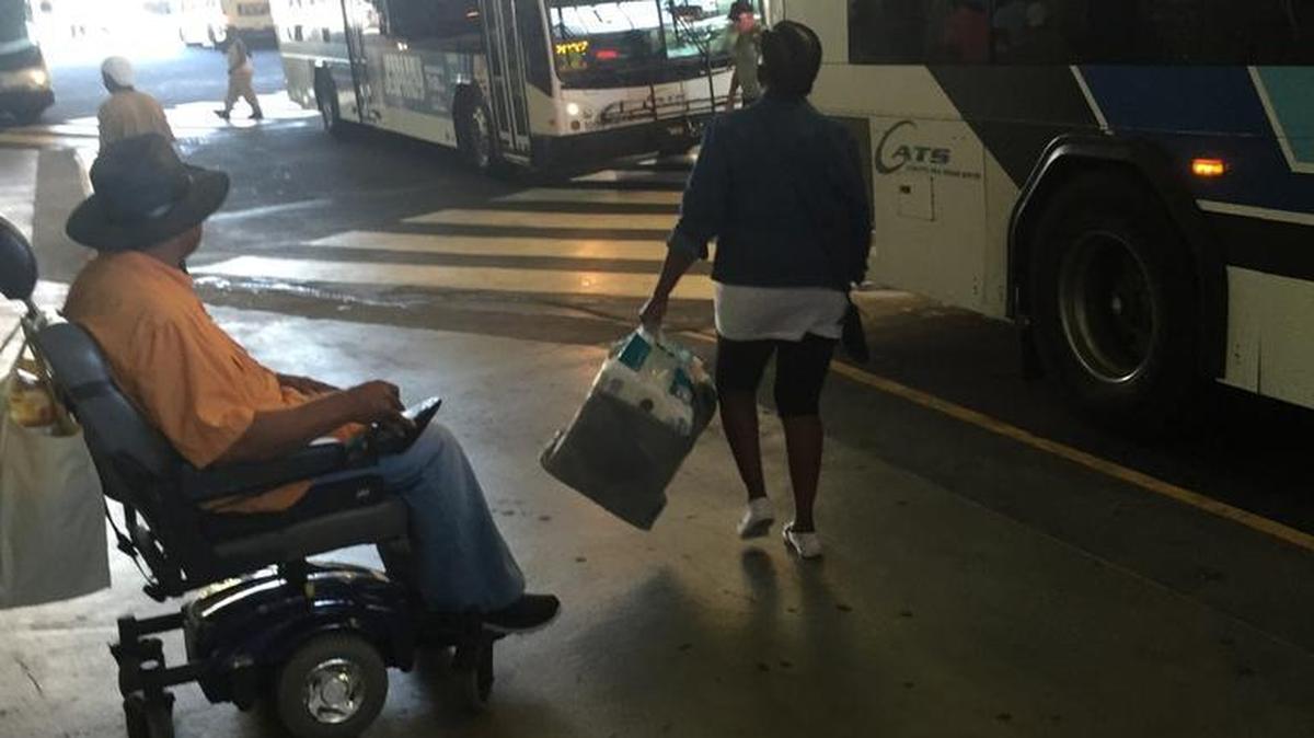 John Quick awaits his bus at the transit center in uptown. The Charlotte Area Transit System is planning to drop a discount on 10-day bus passes but could reconsider that move for seniors and the disabled after criticism.
