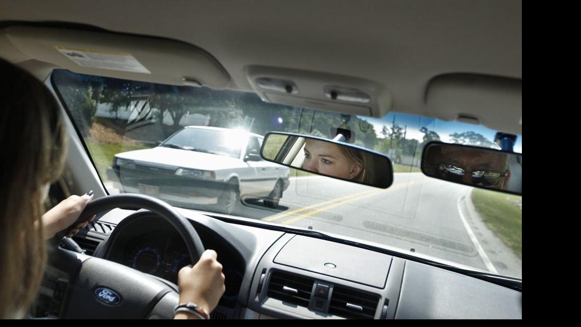 
A 2011 file photo shows Alexandria Hurley, then 14, learning to drive under the supervision of Jordan Driving School instructor Thomas Hunter in Apex. 

