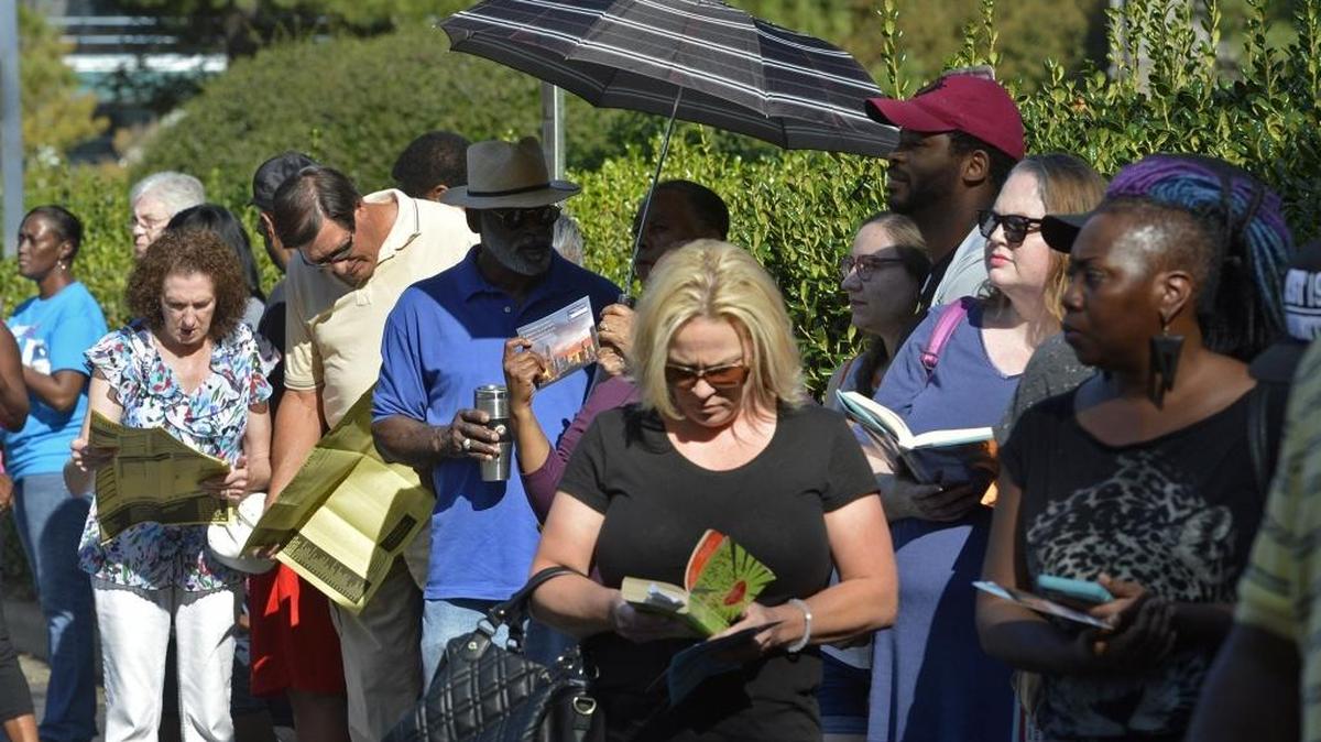 Voters wait in line to vote at University City Regional Library in Charlotte last month. Rural areas went heavily Republican in this year’s election, while Democrats enjoyed an advantage in urban areas – underscoring what some see as a deepening urban-rural divide.