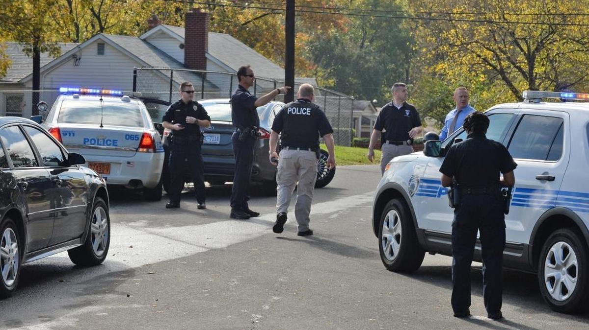 Charlotte-Mecklenburg officers secure the scene where a police chase ended at the intersection of Lasalle street and Taylor Avenue. CMPD wants 125 new officers and 80 support personnel.