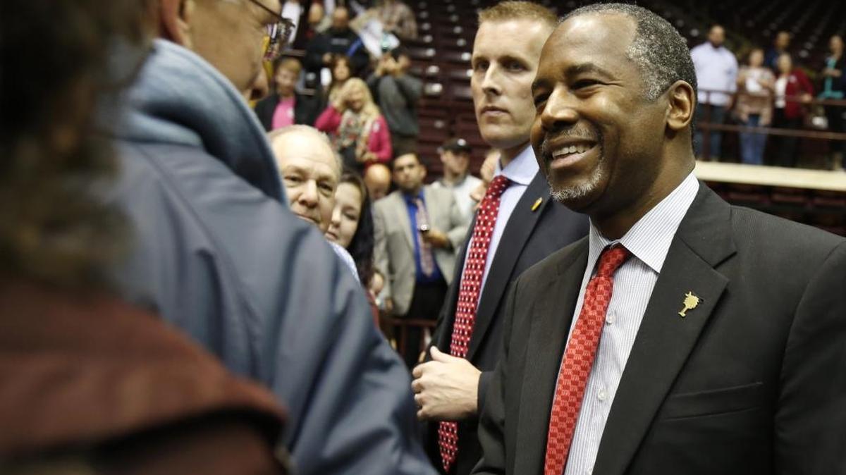 GOP presidential candidate Ben Carson speaks at the Winthrop Coliseum in Rock Hill Wednesday. Ben Carsoin greets the crowd at the end of his appearance.