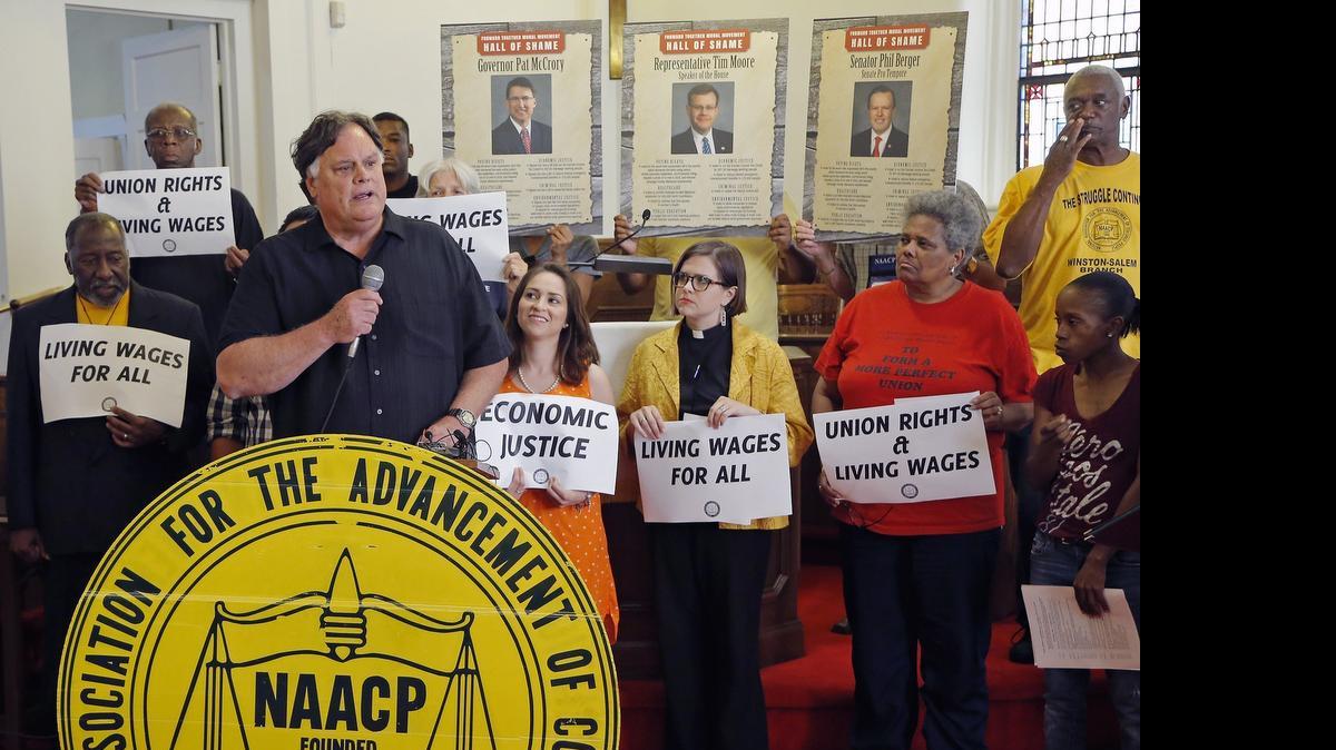 
Gene Nichol, a UNC professor and director of the UNC Center for Poverty, Work and Opportunity speaks at an early rally held at Davie Street Presbyterian Church in Raleigh on May 13, 2015 as the N.C. NAACP has another protest in downtown Raleigh on May 13, 2015. Ten protestors were later arrested at the Legislative Building.
