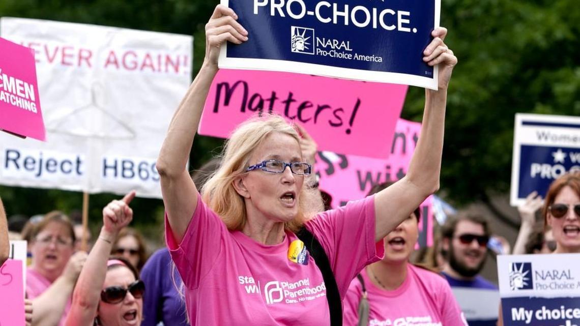 Yevonne Brannon and others gathered on Halifax Mall outside the N.C. General Assembly to protest on July 9, 2013, as lawmakers prepared to discuss abortion legislation.
