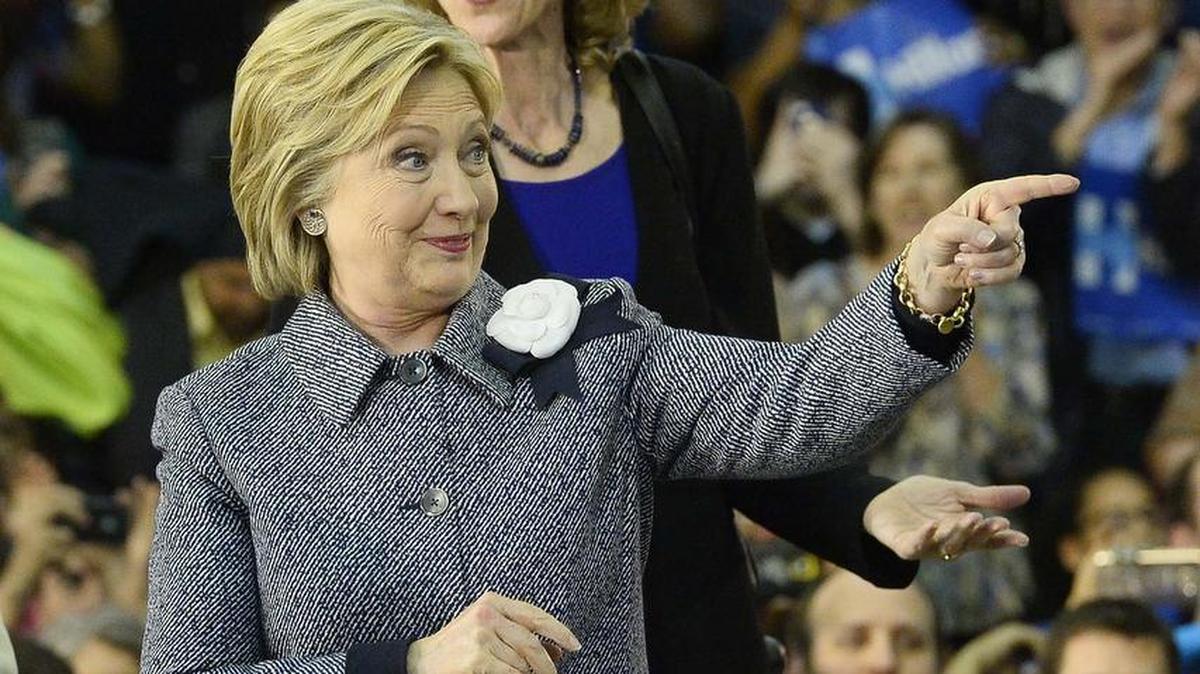 Democratic presidential candidate Hillary Clinton enters the rally to a cheering crowd, Mayor Jennifer Roberts on far right, before Hillary Clinton speaks to supporters during at the Grady Cole Center March 14, 2016. Roberts officially endorsed Clinton for president Thursday morning, along with 19 other North Carolina mayors.
