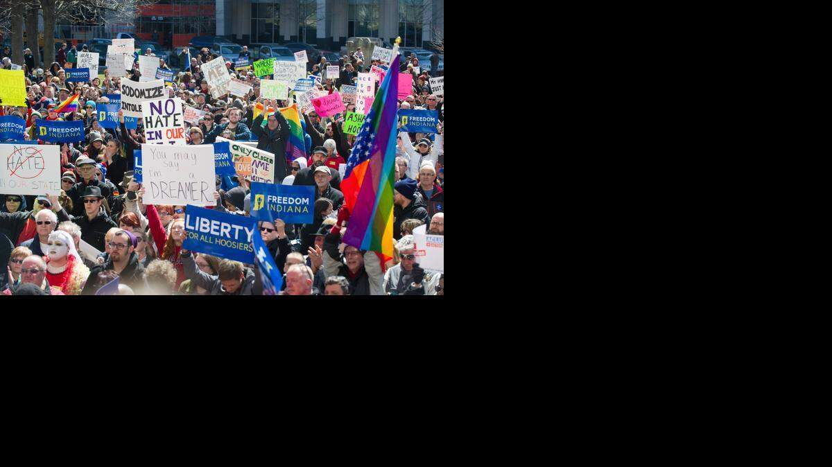 
Thousands of opponents of Indiana Senate Bill 101, the Religious Freedom Restoration Act, gathered on the lawn of the Indiana State House to rally against that legislation Saturday. Republican Gov. Mike Pence signed a bill Thursday prohibiting state laws that “substantially burden” a person’s ability to follow his or her religious beliefs. 
