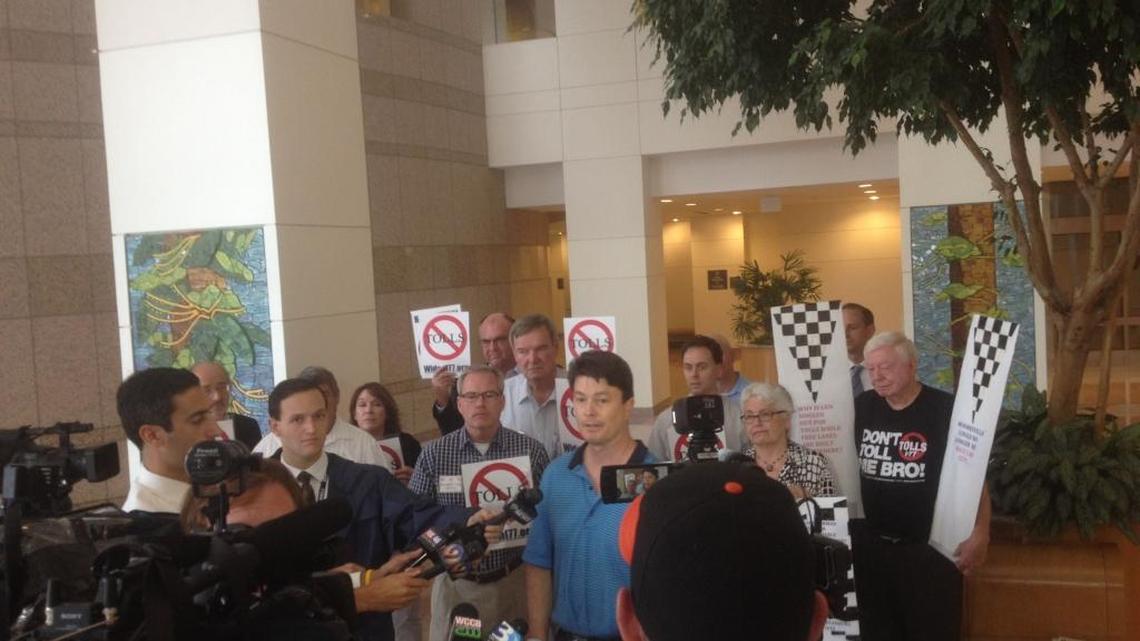 
Members of toll opponent group, Widen I-77, hold a news conference Wednesday at Charlotte-Mecklenburg Government Center
