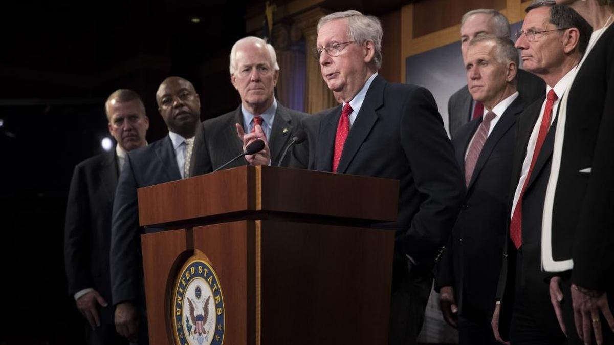 Senate Majority Leader Mitch McConnell (R-Ky.) speaks alongside fellow Republicans after the passage of their tax bill, on Capitol Hill in Washington, in the early a.m. hours of Dec. 2, 2017.