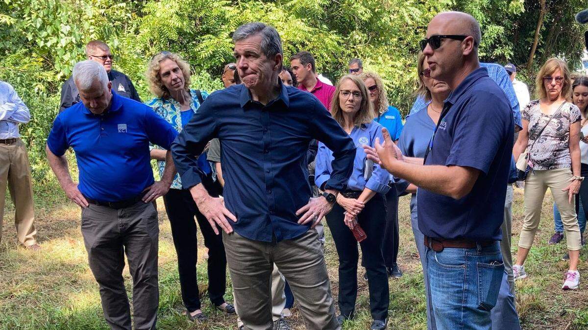 Gov. Roy Cooper joined federal officials from FEMA and the White House Friday, Aug, 12, 2022, for a tour of a project paid for with climate resiliency funds in Gastonia. To Cooper’s right is Robert Cloninger, assistant director of public works for the city of Gastonia.