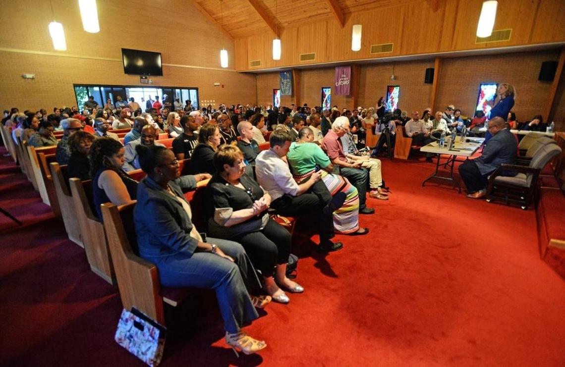 A large crowd watches the Charlotte Mayoral Democratic Primary Debate Kickoff at Weeping Willow A.M.E. Zion Church.