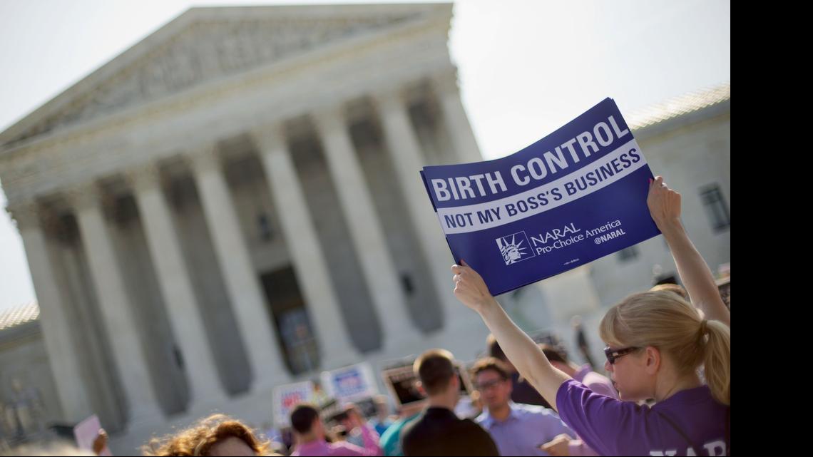 
Supporters of contraceptives rally outside the Supreme Court last June. 
