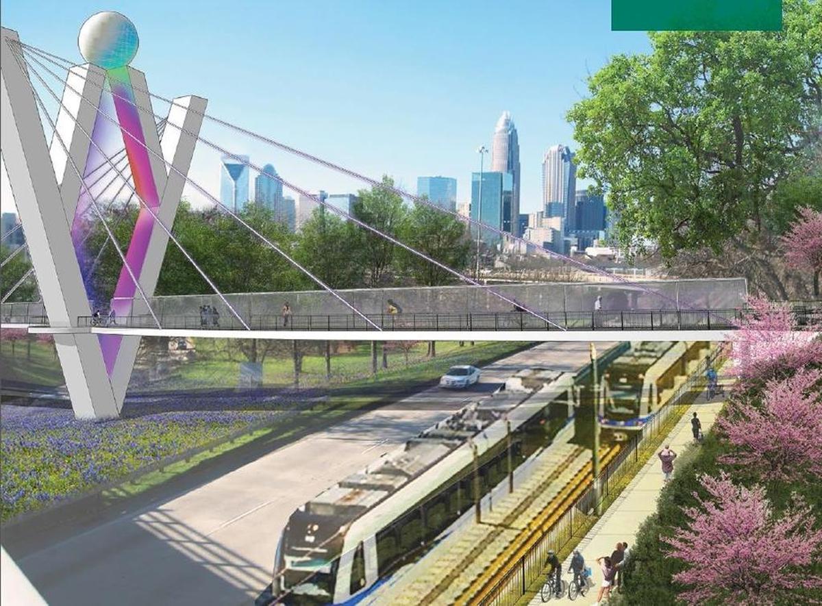This is a possible design for a new pedestrian and bike bridge over the U.S. 74 and I-277 interchange. The proposed Silver Line for light-rail is also pictured.