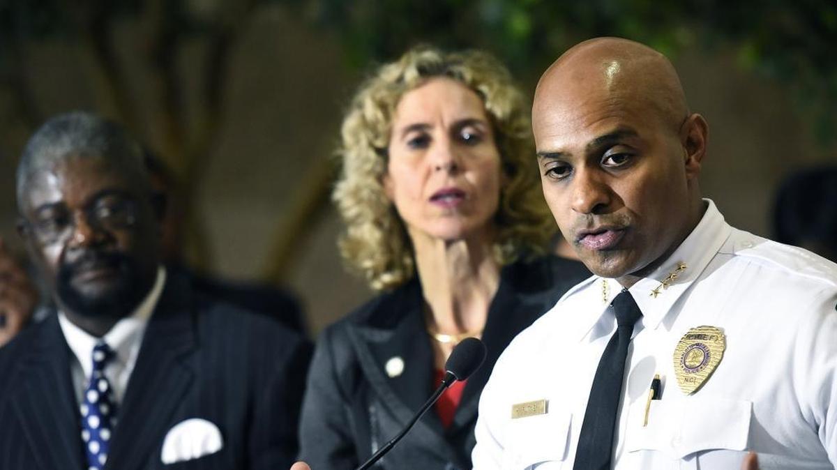 Charlotte-Mecklenburg Police Chief Kerr Putney, right, with Mayor Jennifer Roberts during a news conference at Charlotte-Mecklenburg Police Department headquarters last September.