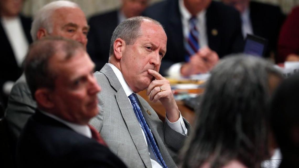Sen. Dan Bishop, center, listens during a Senate confirmation committee hearing at the N.C. Legislative Building on March 2, 2017.