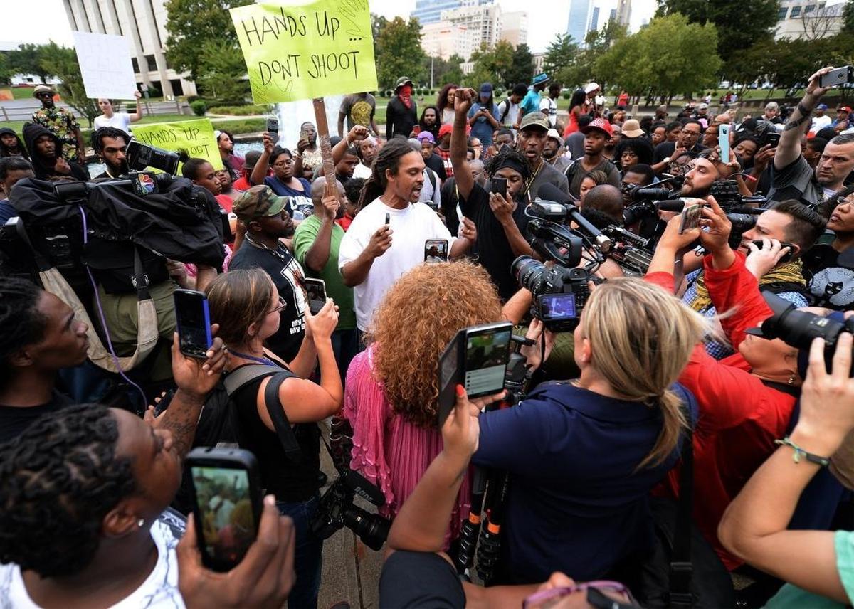 Braxton Winston, center, voices his views during a rally/prayer vigil at Marshall Park after the shooting of Keith Lamont Scott. While there were no formal protest leaders, Winston emerged as a prominent figure and his participation gave rise to his first-ever political campaign.