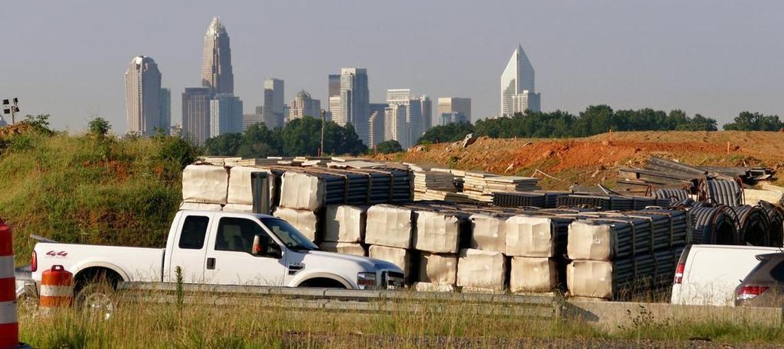 Work continues in the Interstate 77 toll lane construction zone as seen here near the Interstate 85 and Interstate 77 merge area north of Charlotte, Wednesday morning, July 19, 2017.