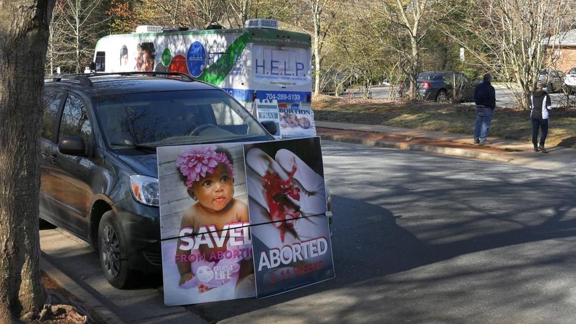 In this Charlotte Observer file photo from 2017, volunteers with the group, Cities4Life, demonstrate outside the A Preferred Women’s Health Center of Charlotte on Latrobe Drive. David Benham, the group’s leader, sued the city of Charlotte and Mecklenburg County on Saturday, April 18, 2020, over what he called the group’s “targeted,” wrongful arrests over North Carolina’s COVID-19-related ban on mass gatherings.