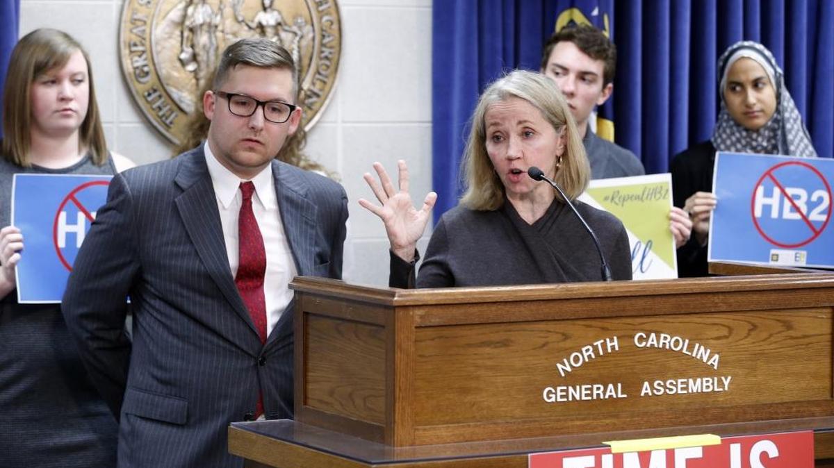 Matt Hirschy with Equality NC, left, and N.C. Sen. Terry Van Duyn speak against HB2 during a press conference at the N.C. General Assembly in Raleigh, NC on Feb. 28, 2017.