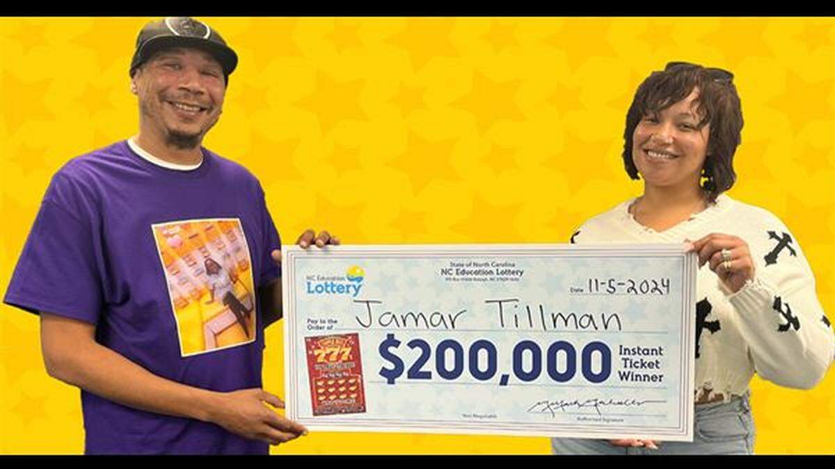 Jamar Tillman, pictured with his sister Jessica, said his age led him to pick a lucky lottery ticket.