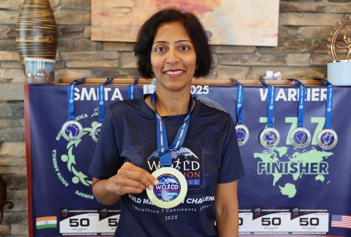 Smita Warrier — and yes, that really is her last name — was among just a few dozen runners who paid $50,000 for a whirlwind trip covering 183.4 miles of running and 28,000 miles of flying.
