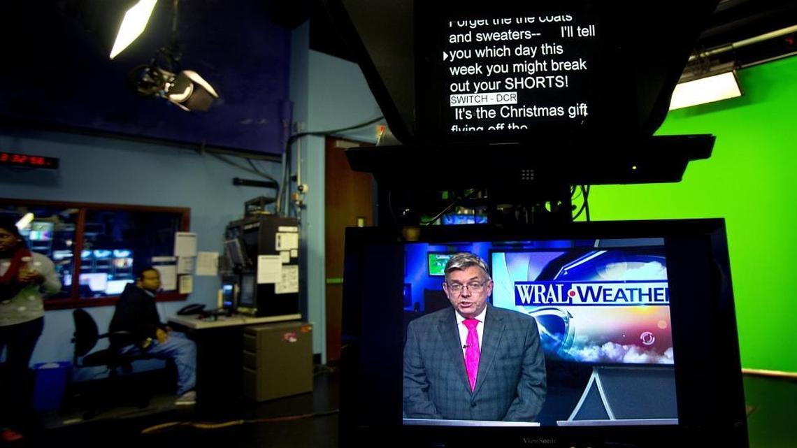 Meteorologist Greg Fishel, 58, prepares for a promo, shot before he goes on-air, at the WRAL studio in Raleigh on Tuesday, December 8, 2015. 