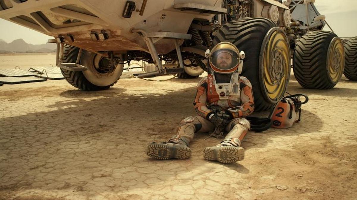 
“The Martian,” starring Matt Damon as an astronaut stranded on the red planet, is a hot movie – but landing a human on Mars is decades away.
